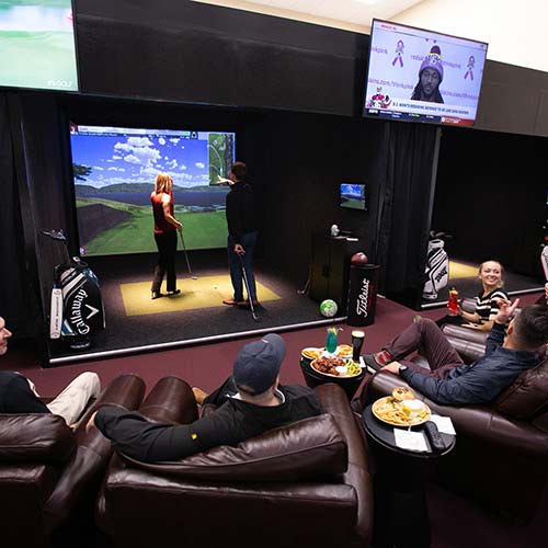Golf simulator for commercial spaces
